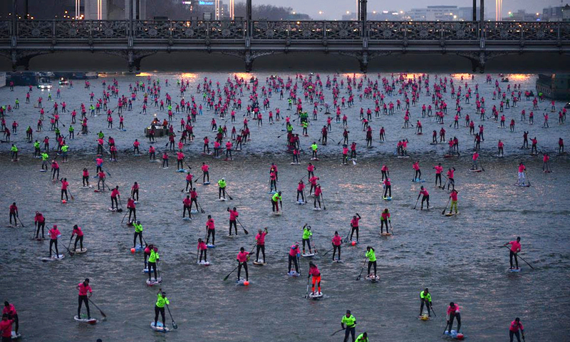 Hundreds of paddlers take to the River Seine in Paris for the Paris SUP Open.jpg
